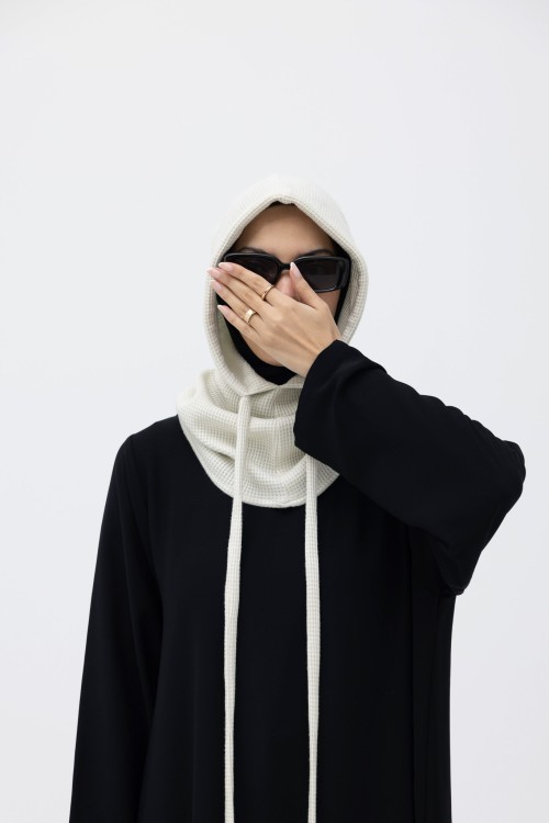 x  Cagoule en maille côtelée creme